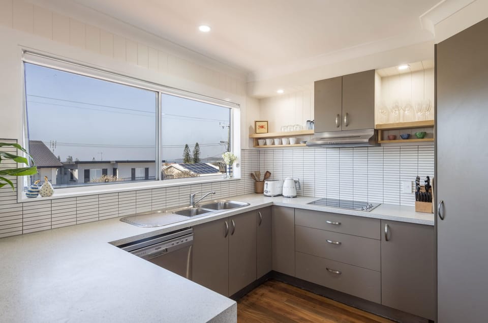 Bimbajong Pines - Coast accommodation in Yamba town with Ocean views - Open plan kitchen, living & dining with ocean views