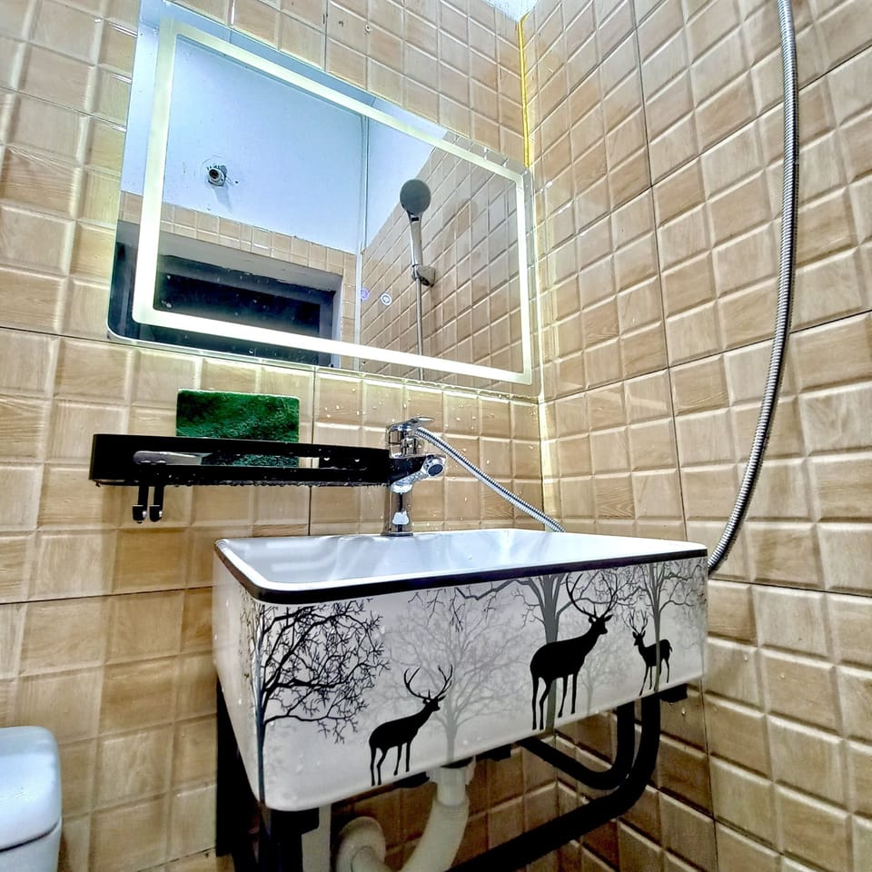 Shower, rainfall showerhead, designer toiletries, hair dryer