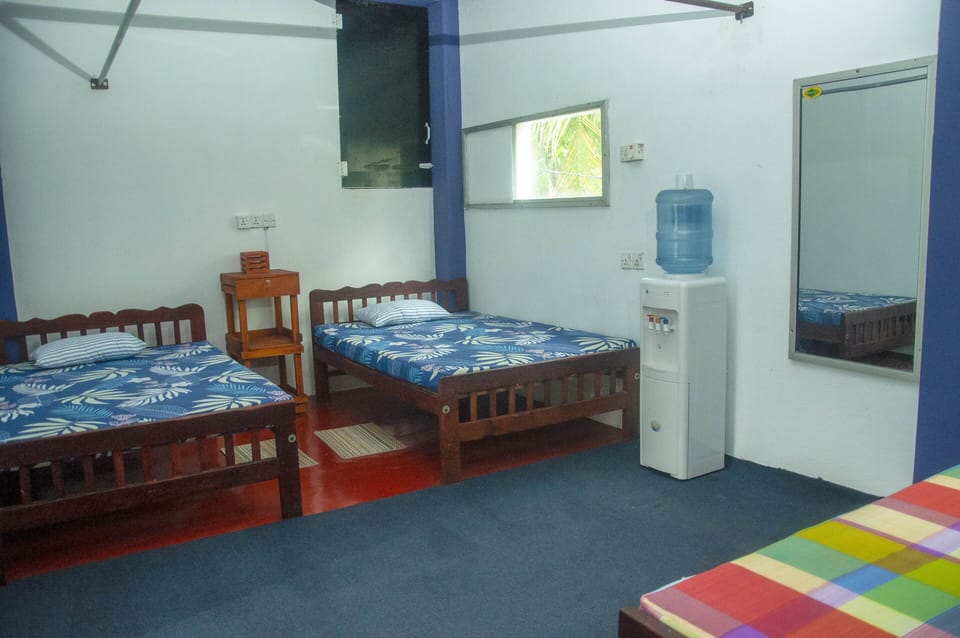 Shared Dormitory, 1 Double Bed | In-room safe, iron/ironing board (on request), WiFi (free), bed sheets