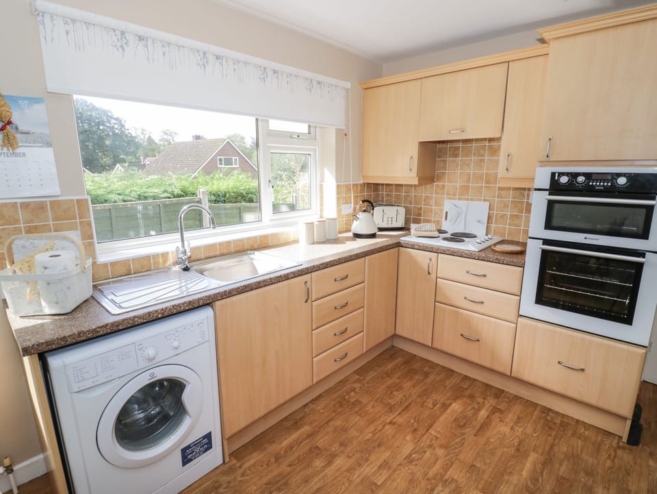 Fridge, electric kettle, toaster, cookware/dishes/utensils