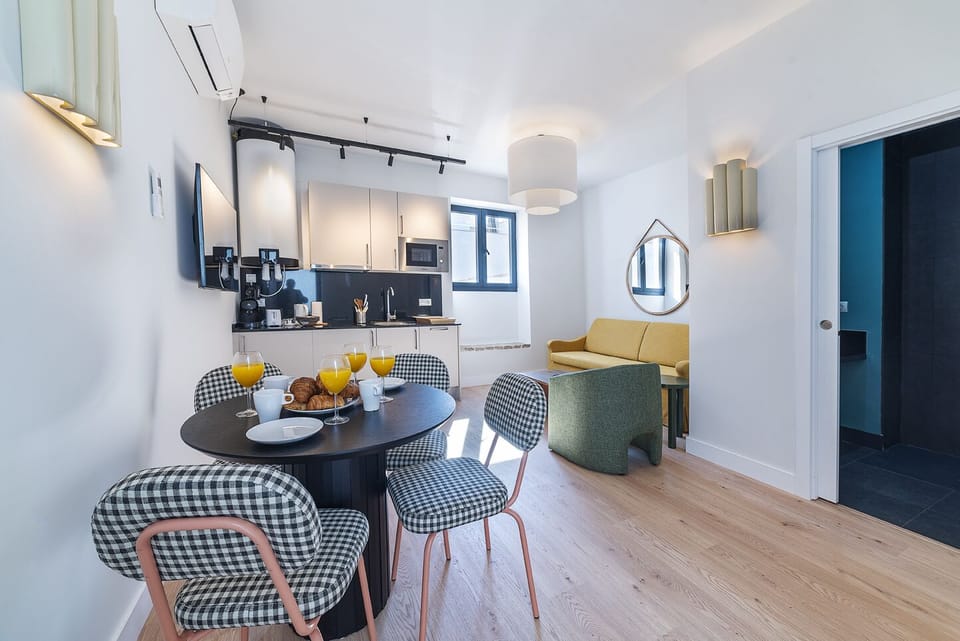 Superior Apartment | Living area | 50-inch Smart TV with satellite channels
