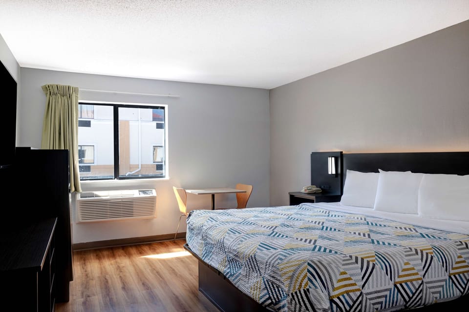 Laptop workspace, free WiFi, bed sheets