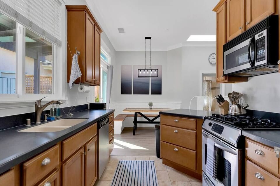 Cozy kitchen equipped with all essentials for whipping up a delicious meal.