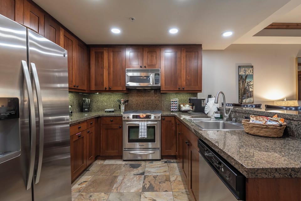 Upgraded kitchen hands-free faucet and other upgrades.  Coffee / tea station.