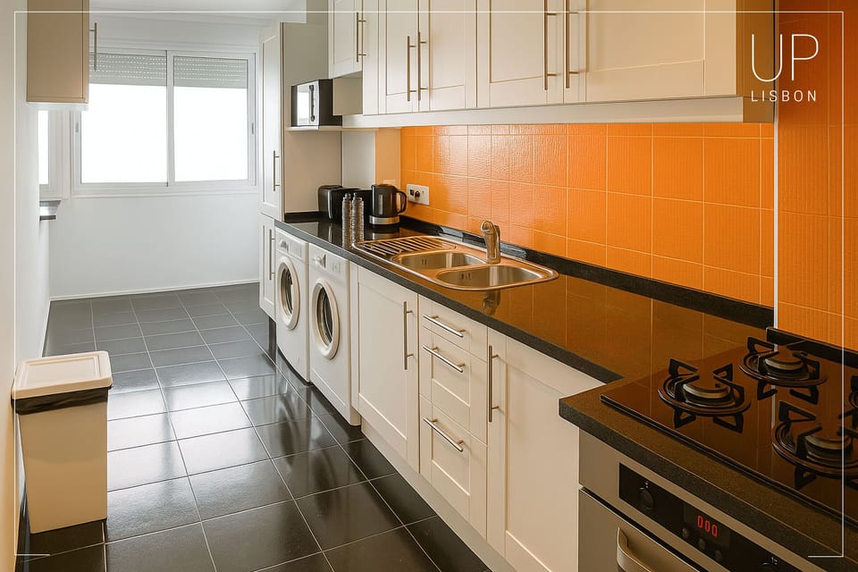 Kitchen with balcony connecting to the dining room. 