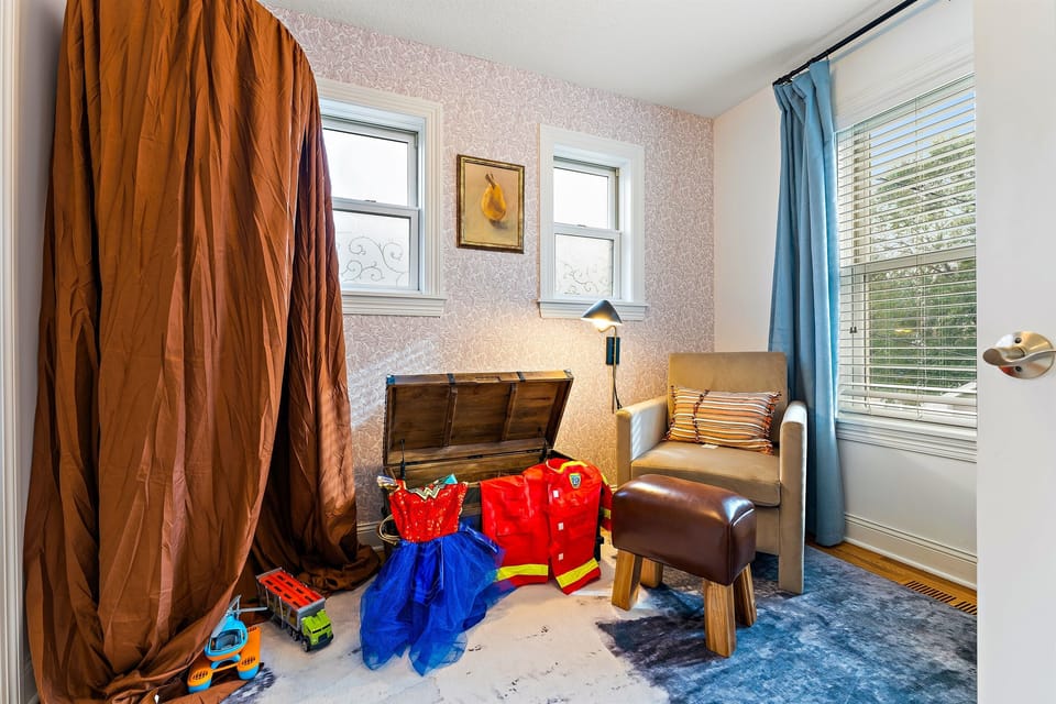 The multi-purpose room provides children with a space to engage in creative play using toys, costumes, and a whimsical tent. "My kids loved all the toys and regardless of age, there's lots to do at this Airbnb." - Peter