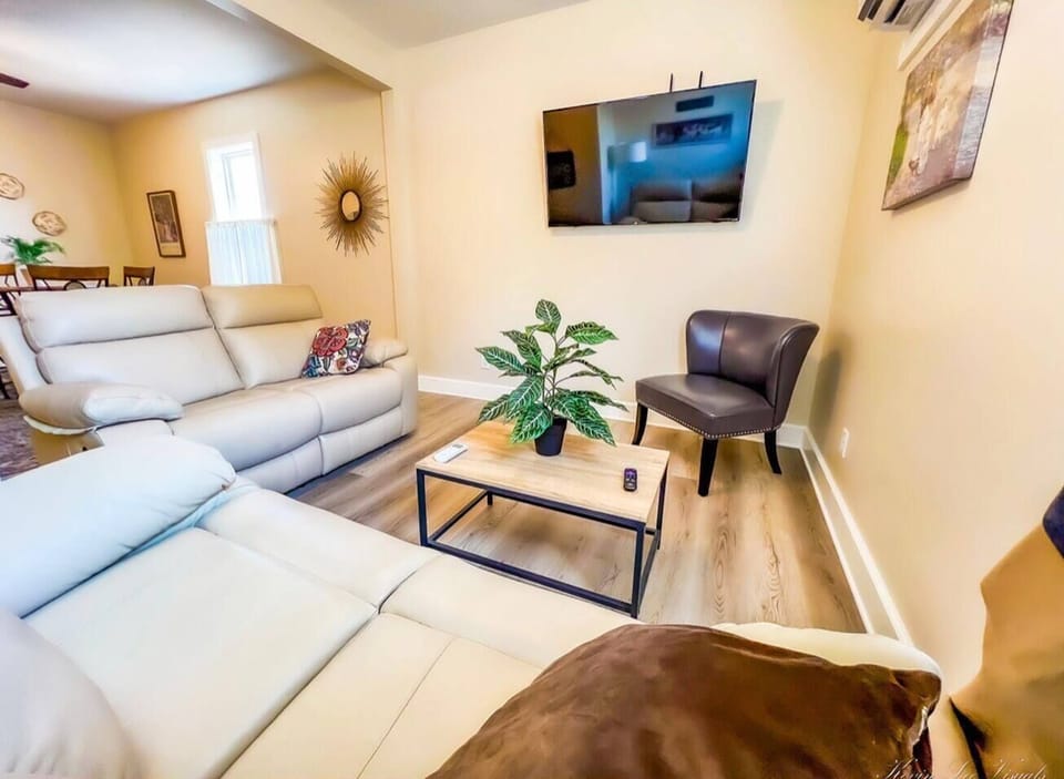 2 leather reclining couches, personal comfort for watching 55" smart tv