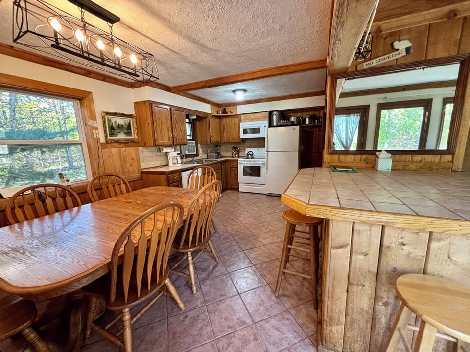 another view of second floor kitchen and island seating (6 barstools)
