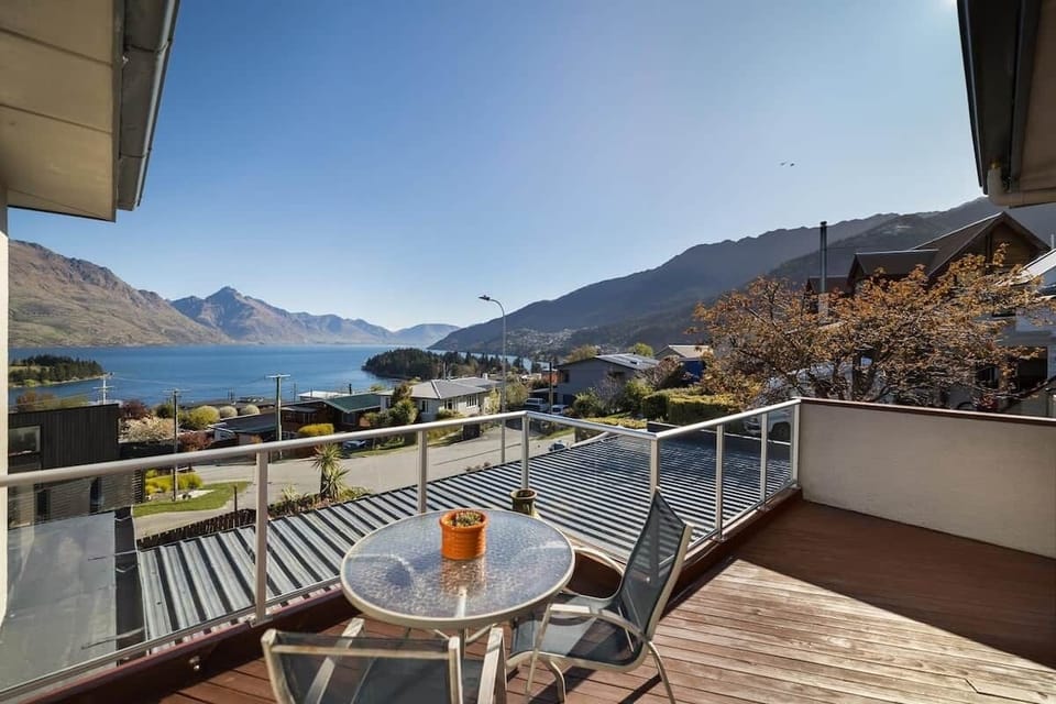Panoramic lake and mountain views from Alpine Lakeview 9A Queenstown