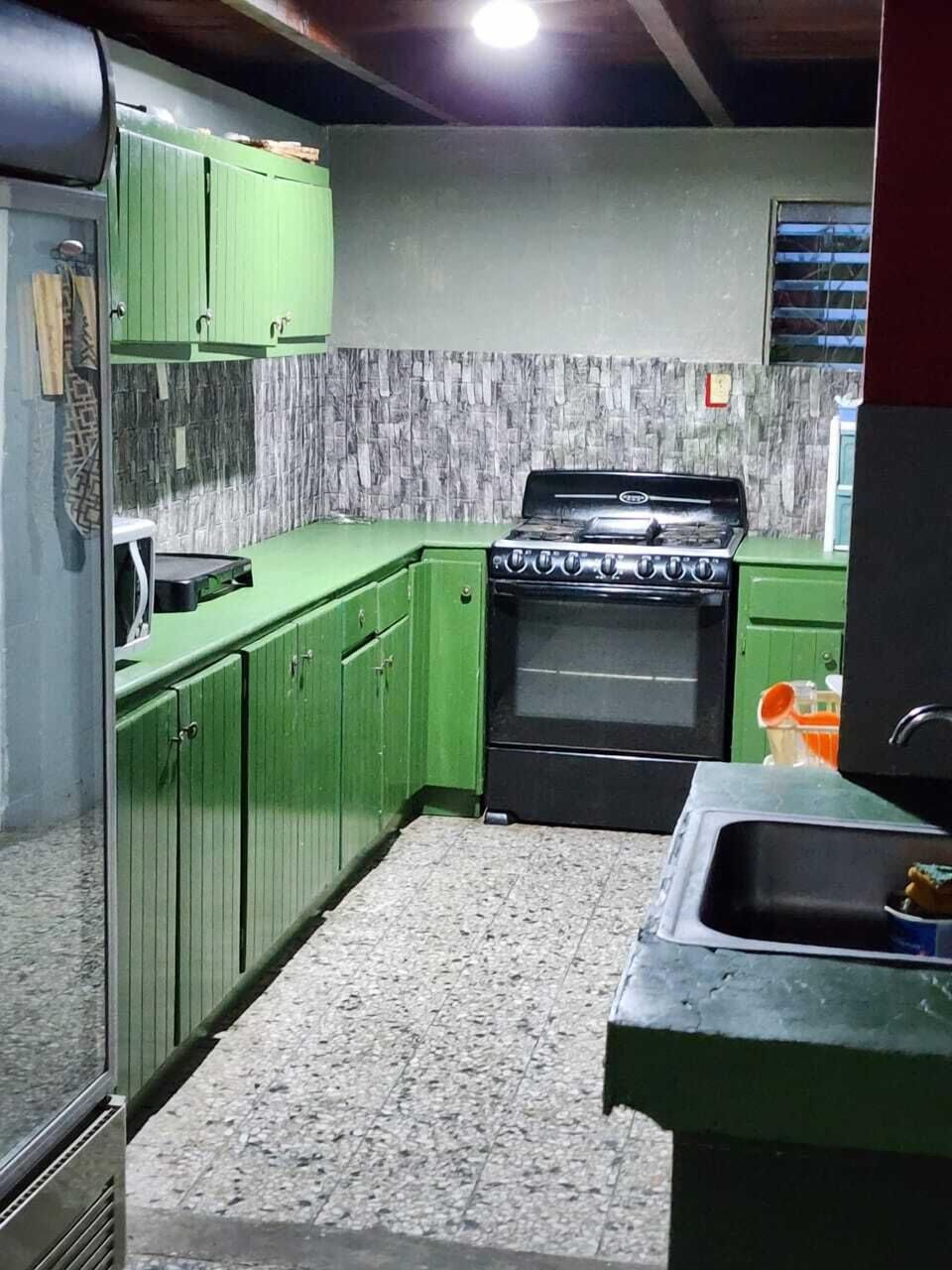 Panoramic Quadruple Room | Private kitchen | Full-size fridge, microwave, oven, stovetop