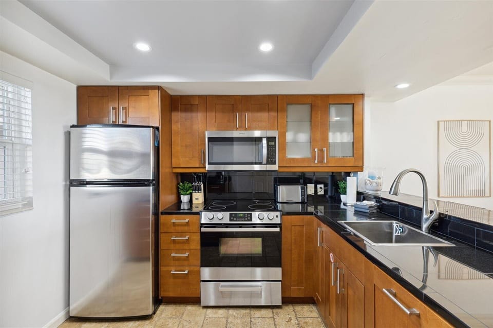 Kitchen w/ stainless steel appliances