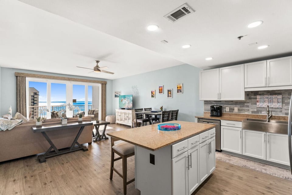 Fully Stocked Kitchen with Ocean Views, Dual Coffee Maker & Island Bar Seating