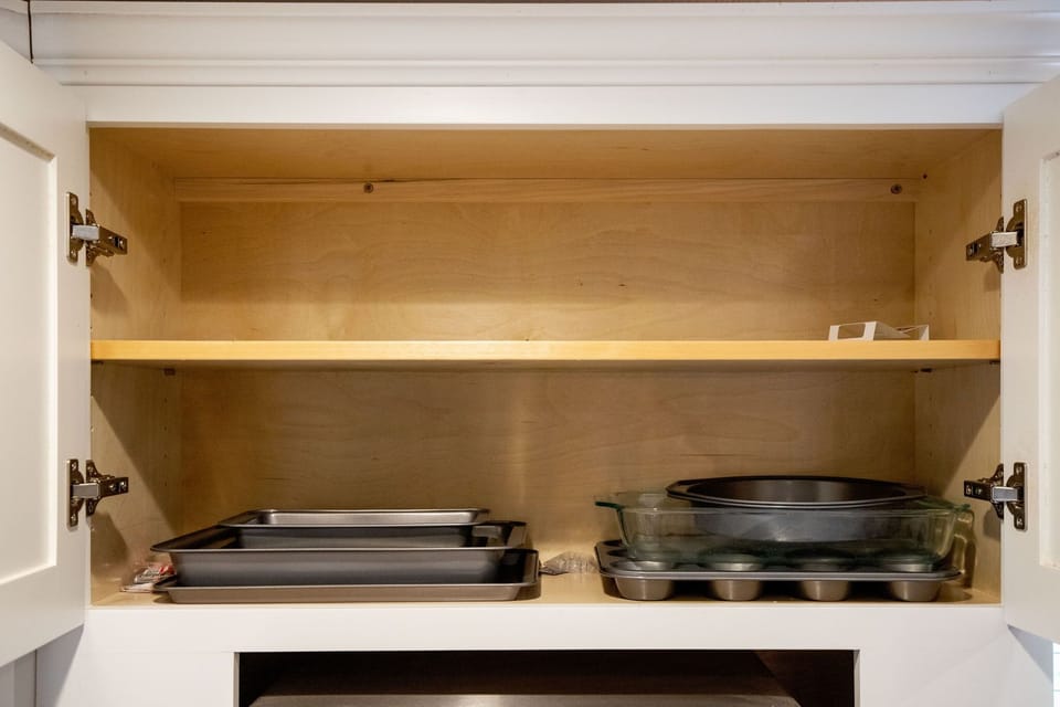 Kitchen: An assortment of baking dishes and pans.