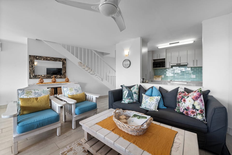 Superior Villa | Living area | 50-inch flat-screen TV with satellite channels