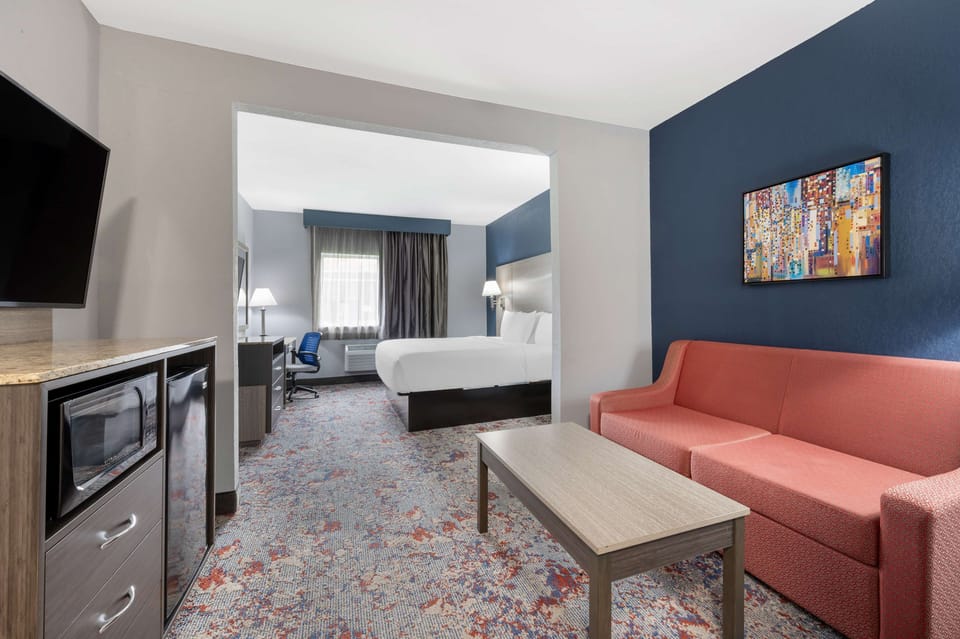 Suite, 1 King Bed, Non Smoking, Refrigerator & Microwave (with Sofabed) | Premium bedding, desk, blackout drapes, free WiFi
