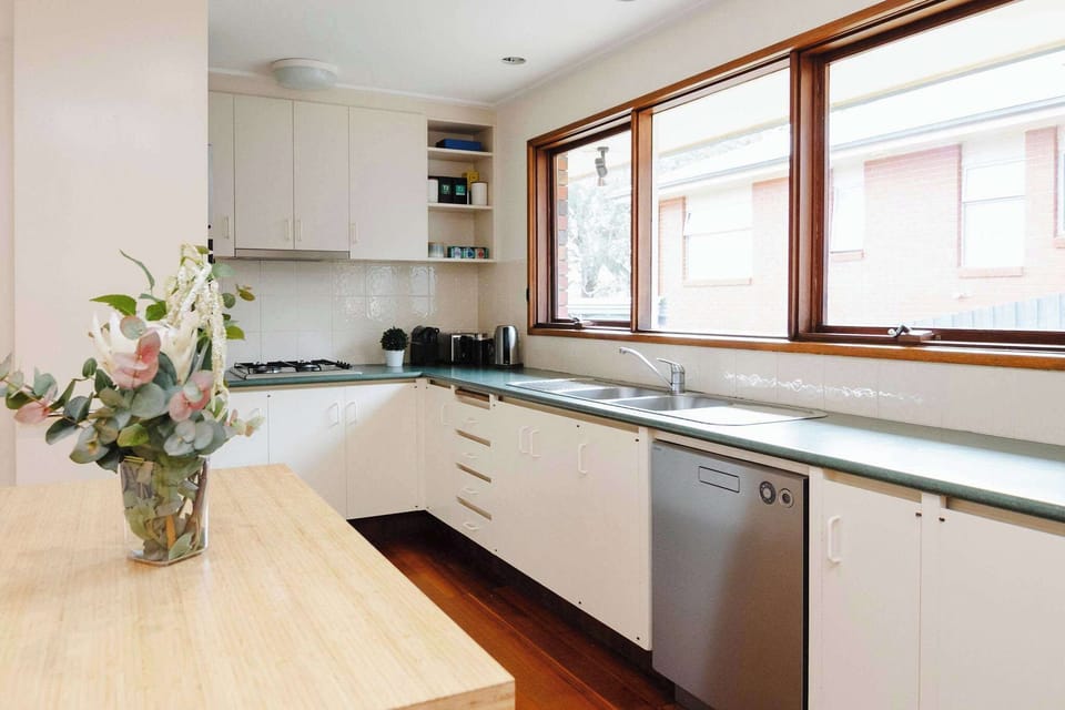 Open plan kitchen with dishwasher