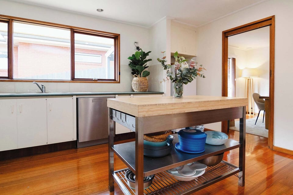 Open plan kitchen with dishwasher