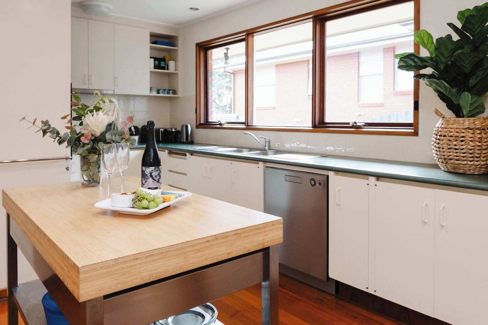 Open plan kitchen with dishwasher