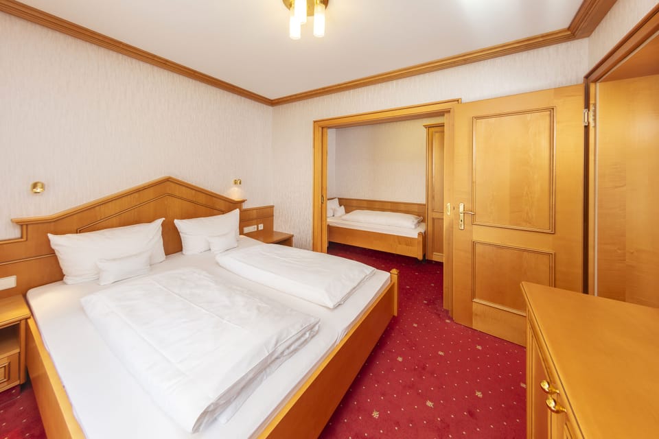 Suite | In-room safe, desk, laptop workspace, iron/ironing board
