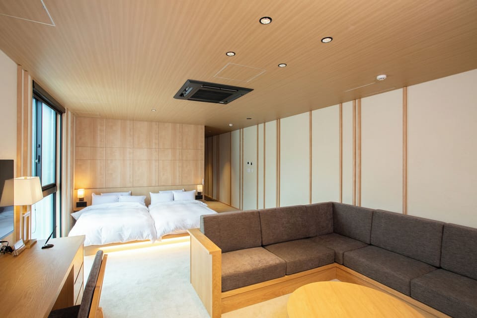 Deluxe Double or Twin Room | Down comforters, in-room safe, laptop workspace, blackout drapes