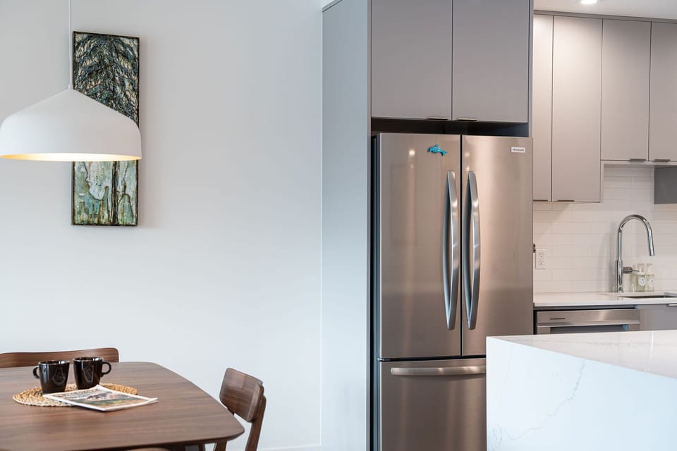 Luxury Condo | Private kitchen | Full-size fridge, microwave, oven, dishwasher