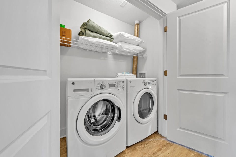Full washer and dryer with detergent and fabric softener provided