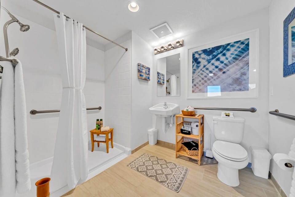 Master bathroom with walk-in shower, spa robes provided, plus hair dryer