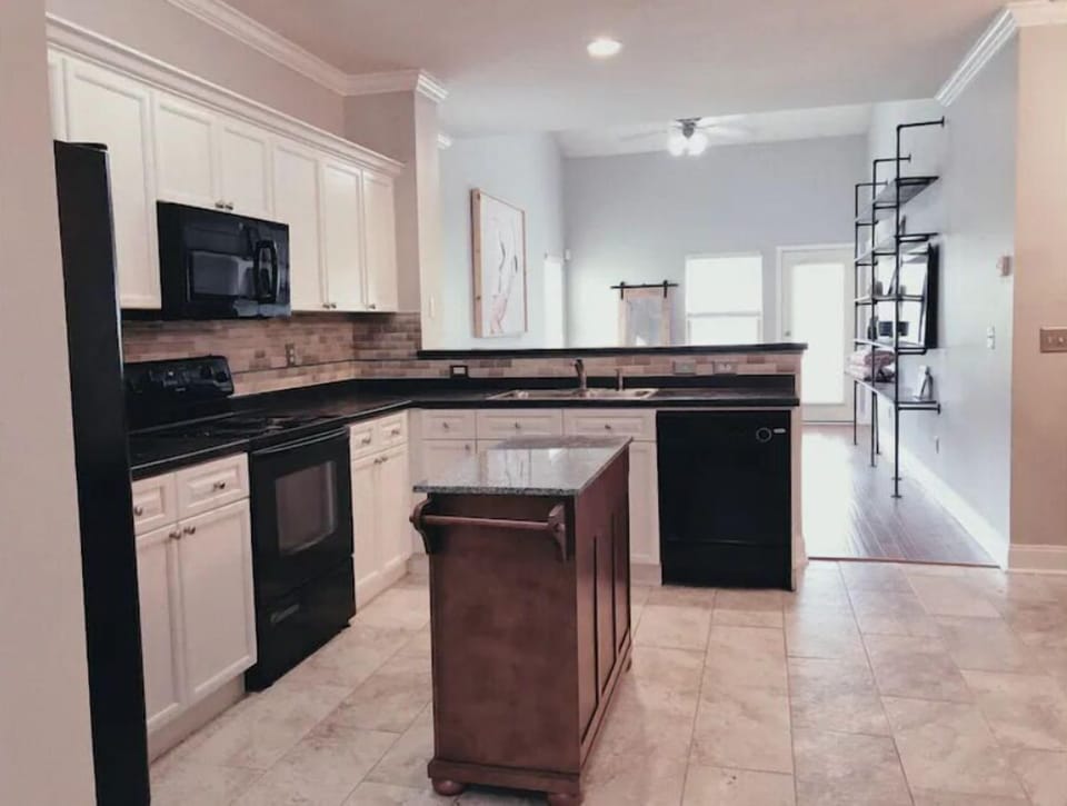 Large updated kitchen with all appliances and well equipped with Kitchen island.