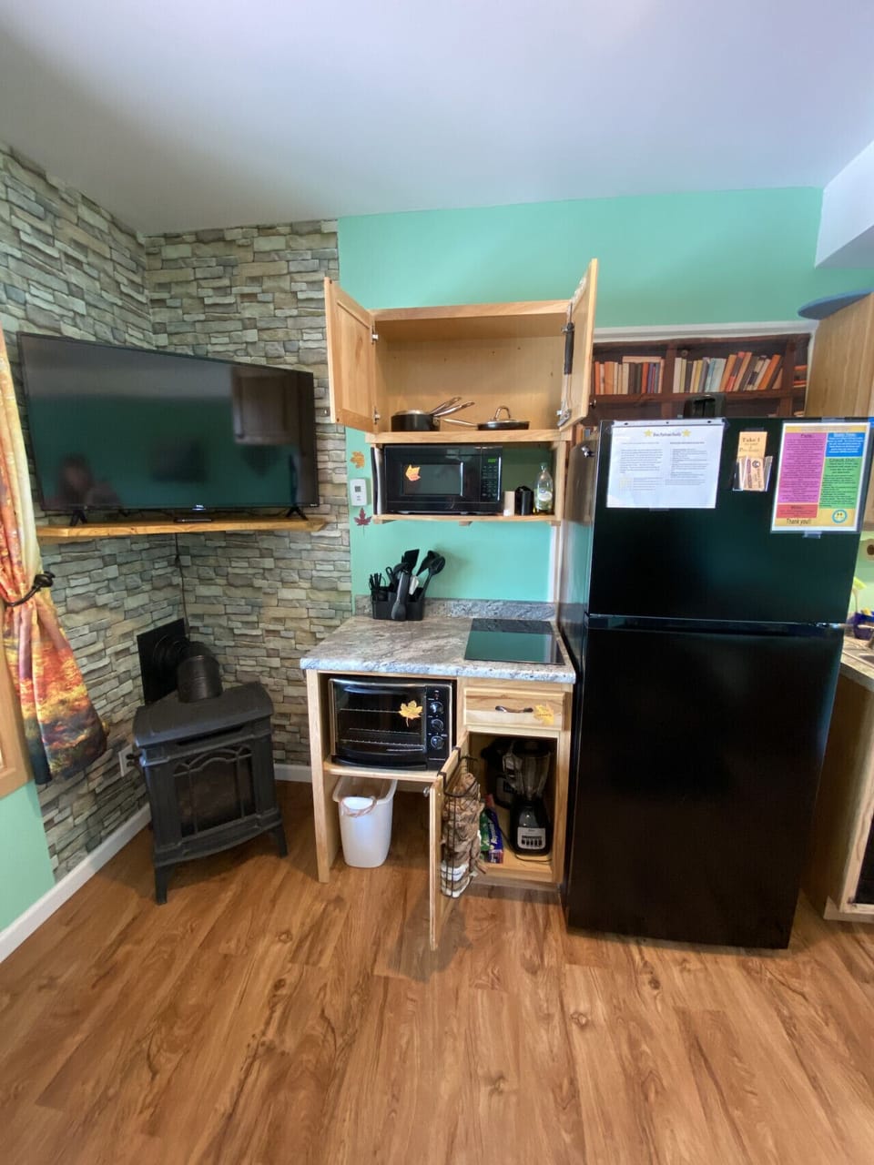 This little kitchen is well equipped for your cooking needs.