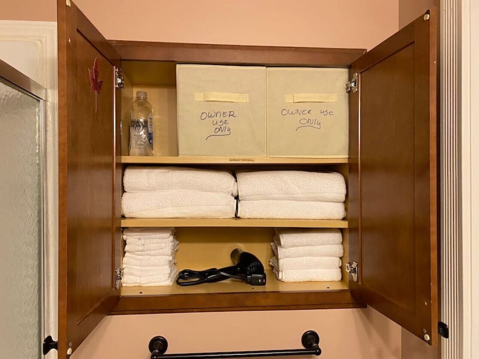The linen cubby in the bathroom.  You will have towels, hand towels, and washcloths available for your use.  There is no laundry on site, but there are 3 laundromats very close by.  The top shelf is for owners use only.  Please don`t use those items.