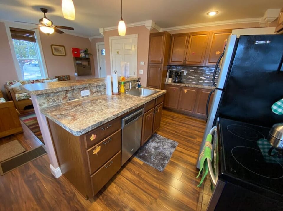 Here is the kitchen.  You have a dishwasher, sink, and quite a bit of cabinetry to hold all the items you will need.