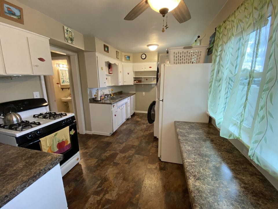 This kitchen is well equipped with full size appliances and just about everything else you could need.