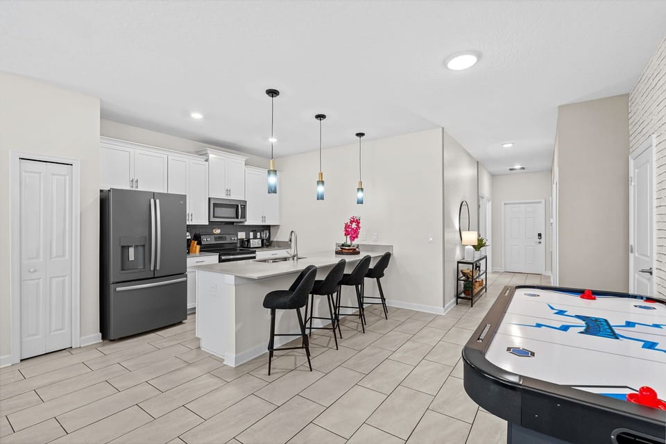 Explore our well-equipped kitchen where kids can enjoy their morning meals.