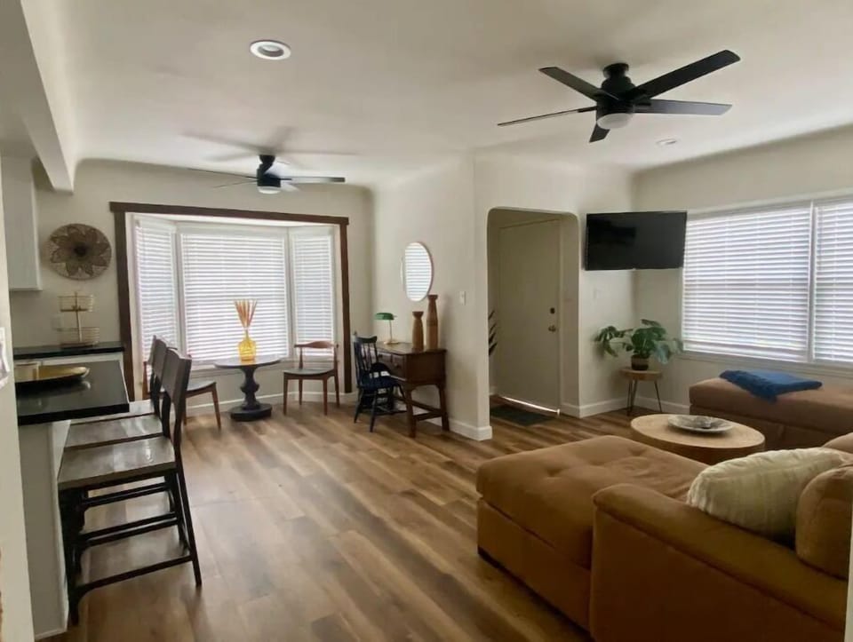 Living room and kitchen and common area with conversational seating