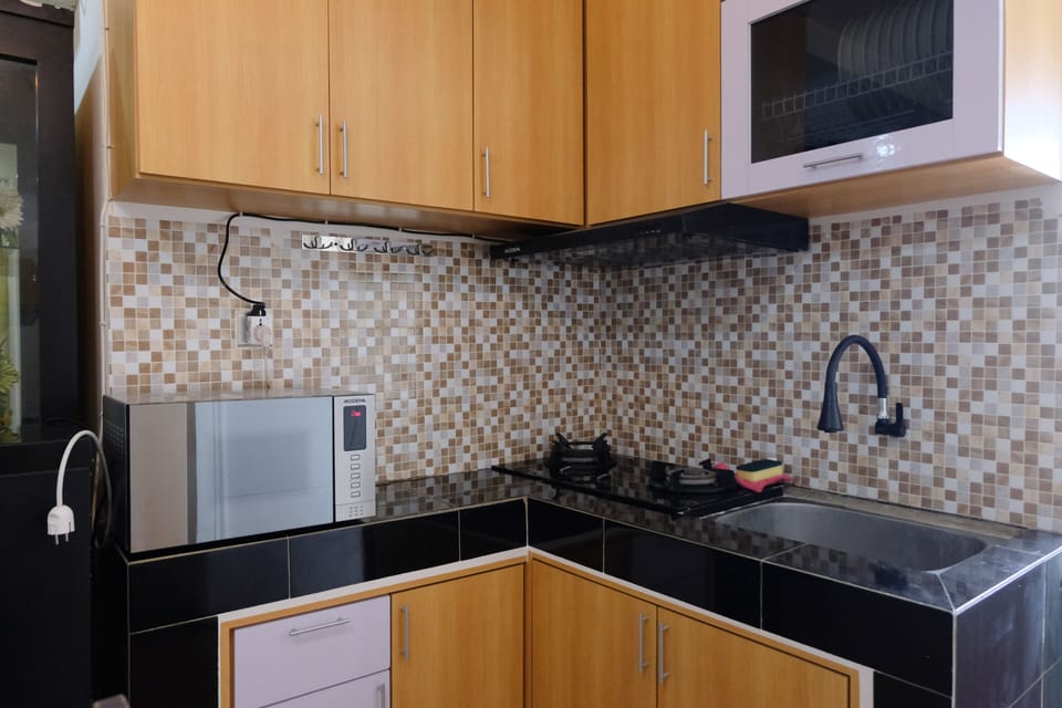 Apartment | Private kitchen | Full-size fridge, stovetop
