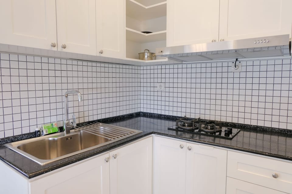 Apartment | Private kitchen | Full-size fridge, stovetop