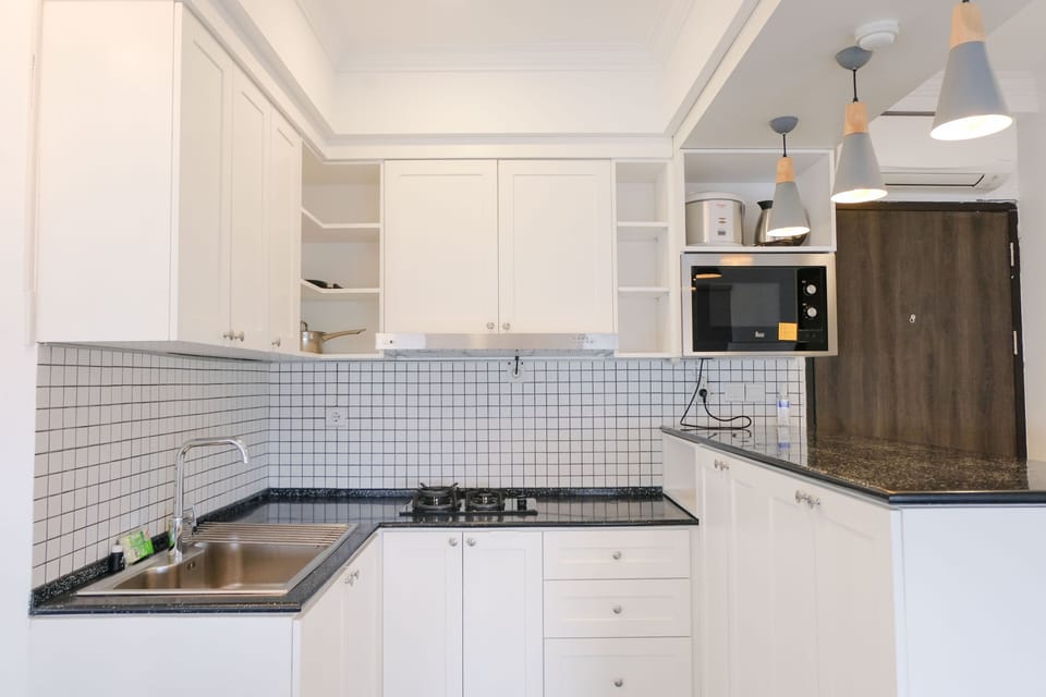 Apartment | Private kitchen | Full-size fridge, stovetop
