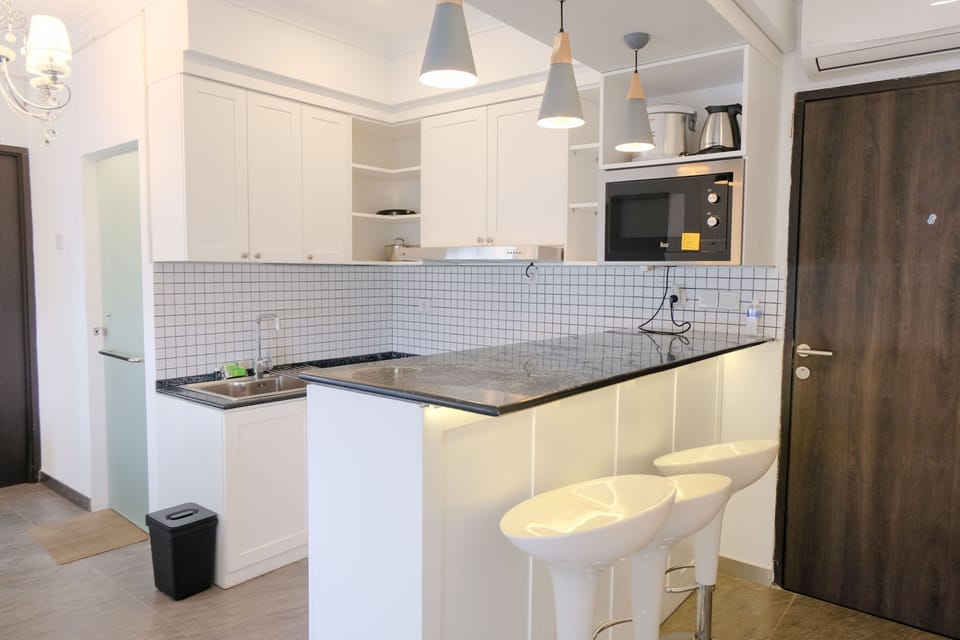 Apartment | Private kitchen | Full-size fridge, stovetop