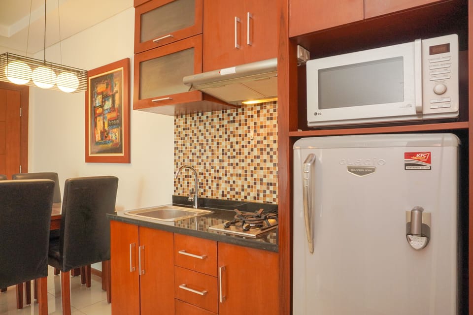 Apartment | Private kitchen | Full-size fridge, stovetop