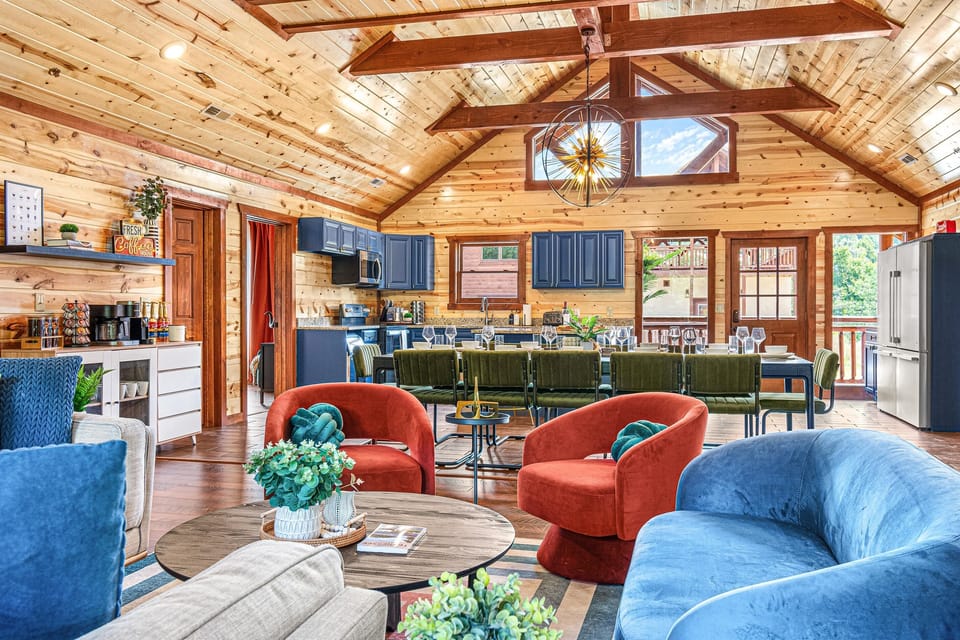 Living Area with an open kitchen, cozy living room, 14 seater dining area and a coffee bar