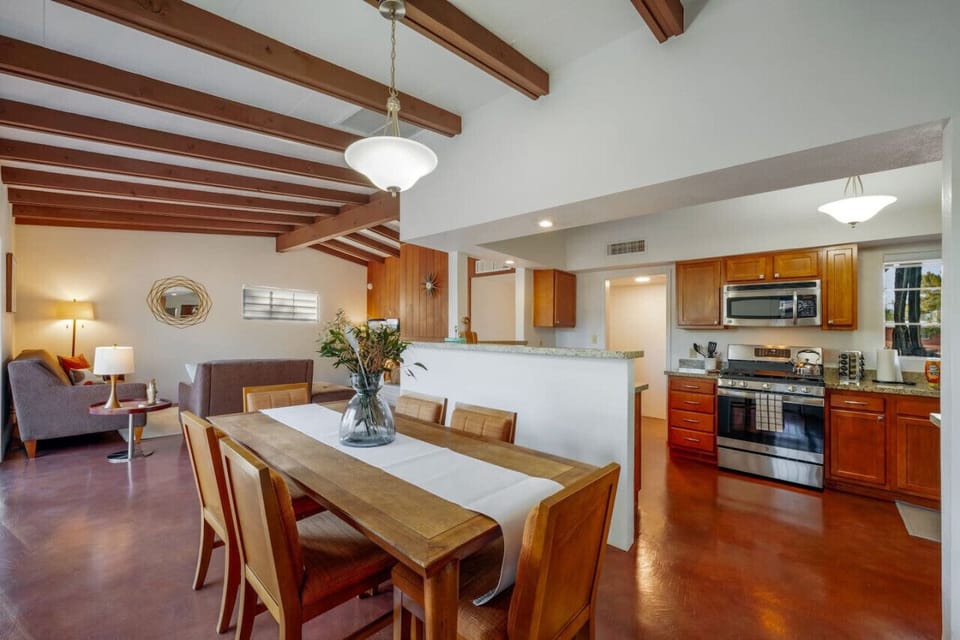 Dining area, open to the kitchen and living room, with seating for six