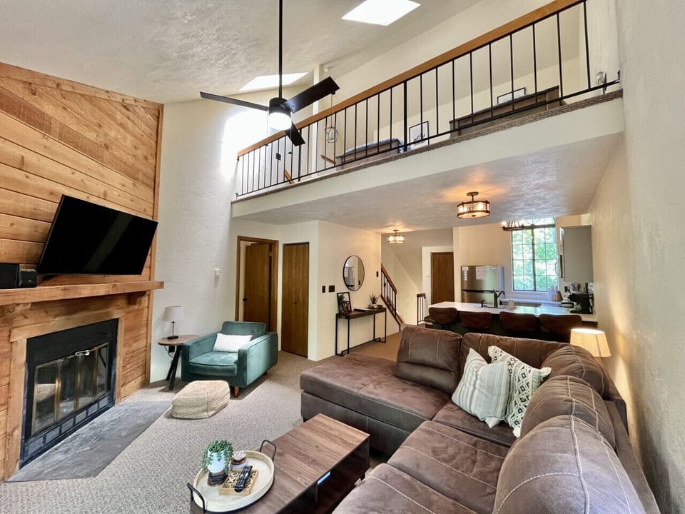 Cathedral ceilings open up the space, perfect for entertaining any time of year!
