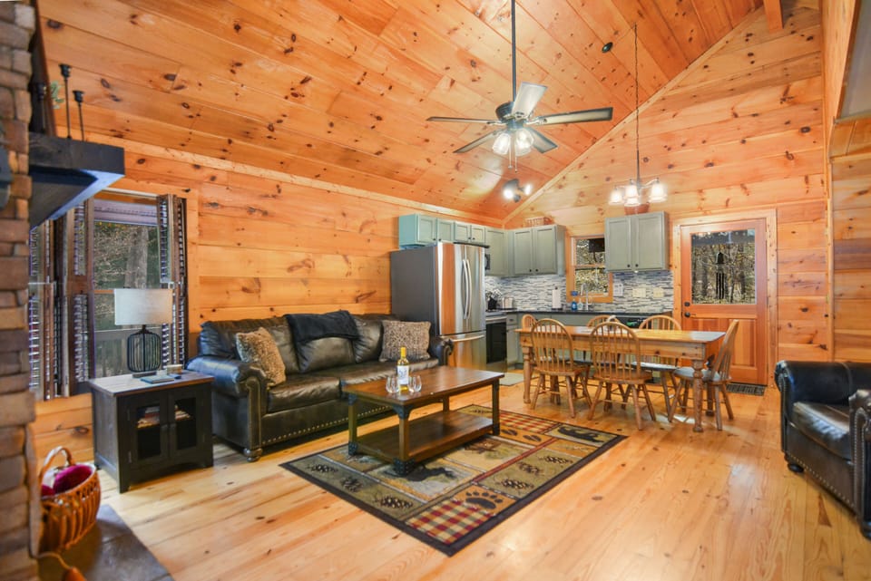 Open concept family room w/ plenty seating and stocked kitchen