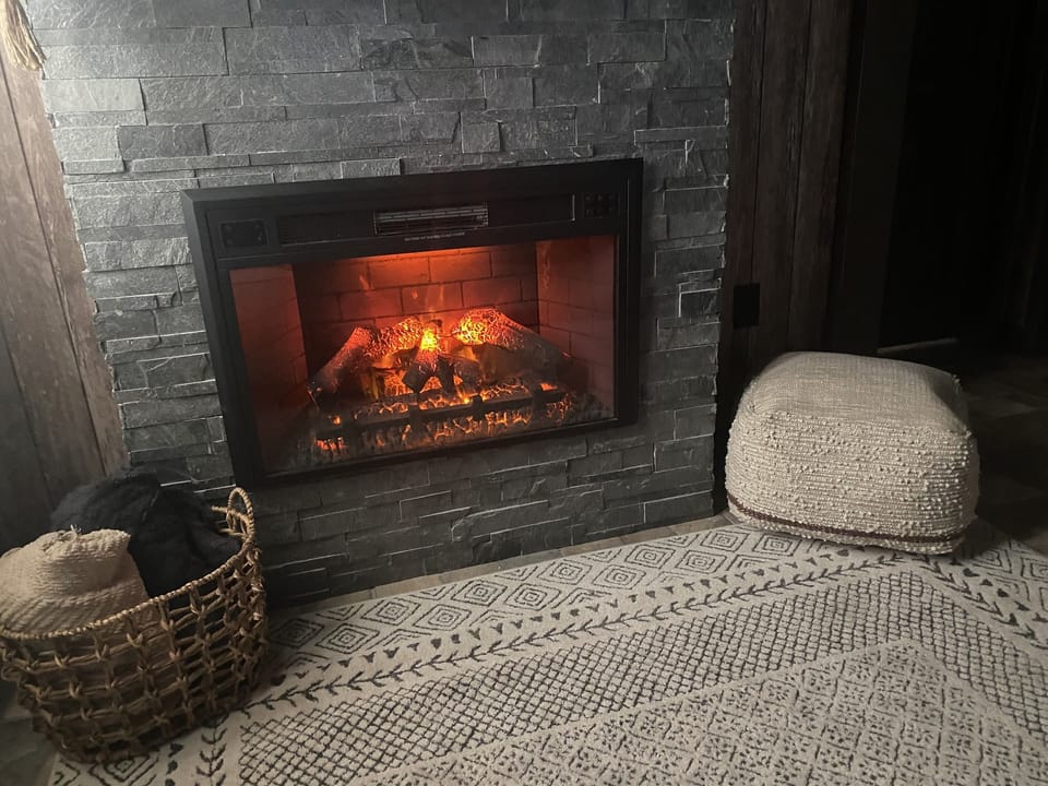 Get cozy with the soft throws and enjoy your book by the fireside.
