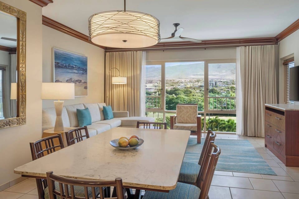 Separate Dining Area with a large table. (Island View - View May Vary)