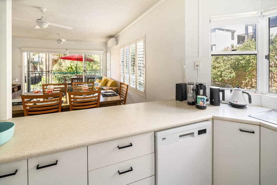 The open-plan layout of the kitchen creates an inviting, communal space.