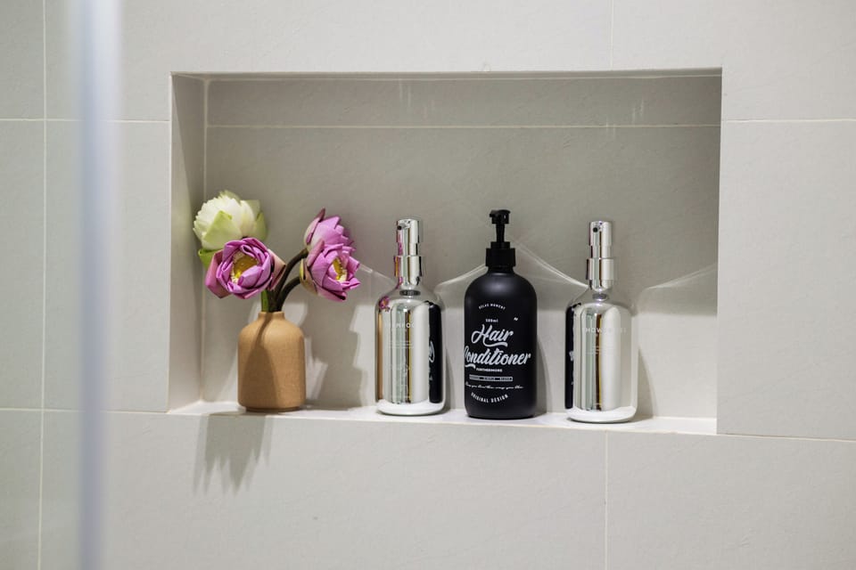 Lotus Blossom Chamber | Bathroom | Shower, rainfall showerhead, free toiletries, hair dryer