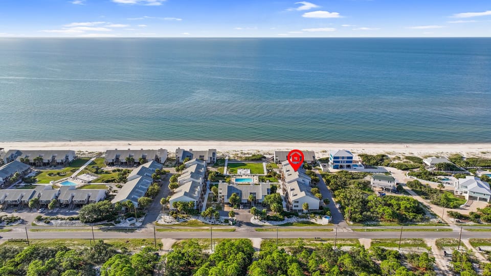 Enjoy beachfront living and pool side views!
