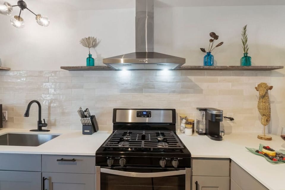 Our fully stocked kitchen features all brand new stainless steel appliances.