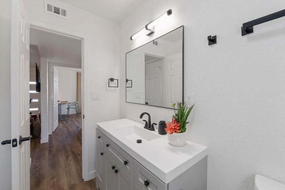 Bathroom features all new appliances: including shower, tub, vanity and toilet.